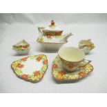 1930's Crown Ducal Happy Days Bachelors tea set of triangular baluster form, decorated with floral