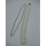 9ct gold curb chain necklace with spring ring clasp stamped 9ct, L46cm, 5.2g and a pearl necklace