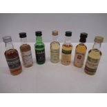 Seven miniature scotch single malt whiskys to include Ardbeg 10 years, Isle of Arran Robert Burns,