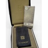 Givenchy lighter in leather pouch and fitted leather case