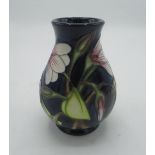 Moorcroft vase on dark blue ground, marks to base