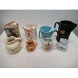 Eighteen branded ceramic whisky advertising water jugs, Famous Grouse, Glenlivet, Johnnie Walker etc