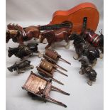 Selection of ceramic dray horses, three dray style wooden carts, child's guitar