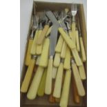 Collection of assorted cream handled cutlery