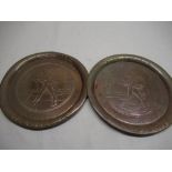 Pair of Johnnie Walker embossed copper bar trays D34cm