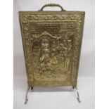 Brass fire screen depicting Sir Walter Raleigh laying down his cloak for Queen Elizabeth I