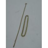 9ct gold chain necklace with spring ring clasp stamped 9ct L40 and a yellow metal rope chain