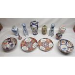 Collection of Oriental vases and bowls, including two monkey candlesticks in blue and white