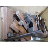 Collection of eleven early C20th moulding planes plus and a smoothing plane etc