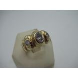 Hallmarked 9ct gold ring with three white stones inset in ridged mount by W M (D) London, 9.375,