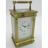 Fema, London, retailed by Wm. Forsdyke C20th brass cased carriage clock timepiece with visible lever