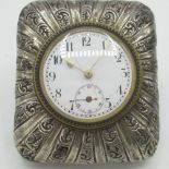 Late Victorian silver cased desk timepiece with repousse decoration, Birmingham 1897