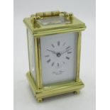 Swiss, retailed by David Peterson, England, C20th brass cased carriage clock timepiece with