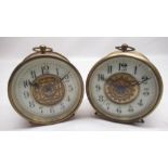 Two late C19th/early C20th French brass cased drum travel clocks