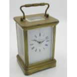 Swiss, retailed by Matthew Norman, London, C20th brass cased carriage clock timepiece with visible