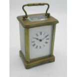 Early C20th French brass cased carriage clock timepiece with later replaced platform lever