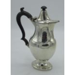 Geo.V Sterling silver hallmarked coffee pot, baluster body with ebonised handle, by Nathan &