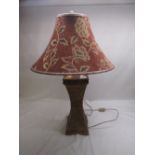 Decorative Chinese style gilt plaster table lamp in a scaled design with floral shade, H82cm