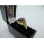 Hallmarked 9ct gold Gents ring with claw set oval cut garnet, by ELD, 375, Birmingham, size R, gross