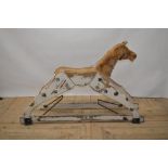 Carved wood striped rocking horse figure with swing rocker type base, H79cm