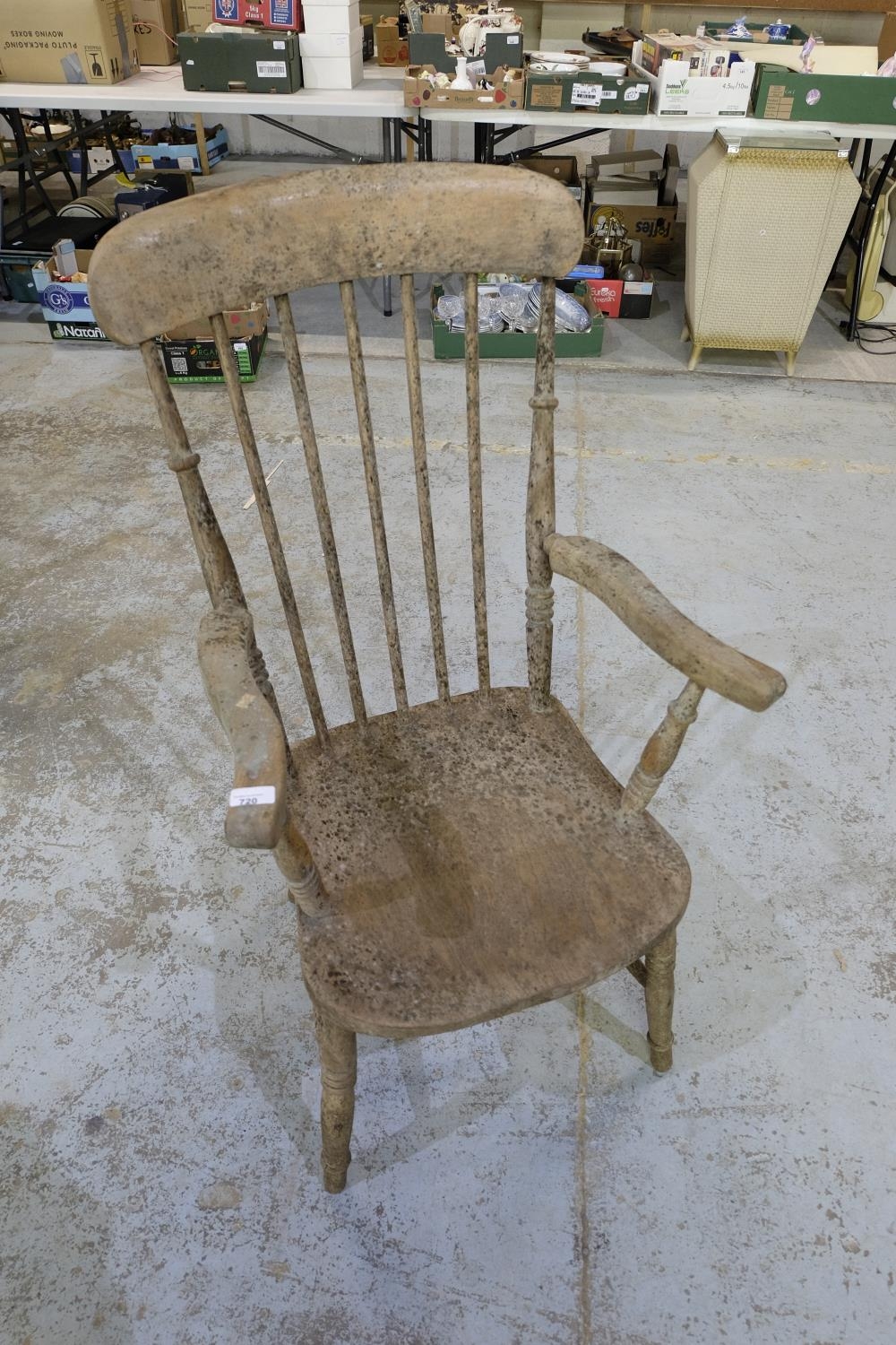 Early C20th beech stick back farm house style arm chair with H shaped under stretcher and turned