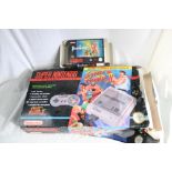 SNES entertainment system console (Street Fighter II edition, with original SFII cartridge) and 'the