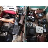 Collection of cameras and other photographic equipment, including Zenith E, Goed Fed 3, SLR