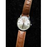 Longines Automatic wristwatch with date, stainless steel case on later Tissot tan leather strap,