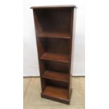 Cherry finish bookcase, moulded top, three shelves on plinth base, W37cm D20cm H105cm
