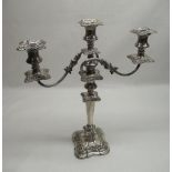 Geo.V hallmarked Sterling silver repoussé three light two branch candelabra by Barker Brothers,