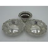Pair of Edw.VII circular bon bon dishes, pierced and repoussé with C scroll and flowers, makers mark