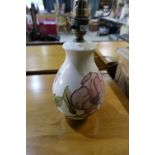 Moorcroft table lamp with floral pattern and beige ground