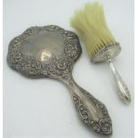 Geo.V hallmarked Sterling silver hand mirror with repoussé decorated back by Henry Matthews,