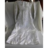 Ivory and cream silk wedding dress with gold floral wire decoration, comprising dress, train and