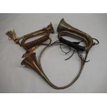 Brass and copper bugle, stamped J. W. York & Sons, Michigan, 1915, L27cm, another smaller bugle,