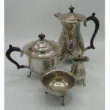 Geo.V hallmarked Sterling silver four piece tea service on pad feet by Robert Pringle & Sons,