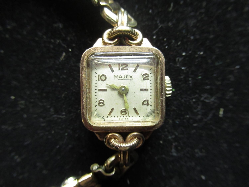 Ladies Majex gold cased hand wound wristwatch on later expanding bracelet, hallmarked 9ct yellow