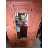 Victorian stripped pine wardrobe, with moulded cornice, central mirror door above a long drawer on