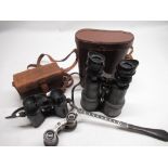 C20th French binoculars retailed by Army and Navy stores in brown leather case, pair of Radium