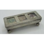 Victorian hallmarked Sterling silver three section stamp stamp dispenser, with hinged lid on four