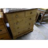 Modern quality waxed pine chest of two short above three long drawers on raised bracket supports,