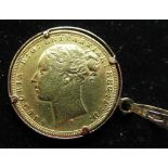 Victorian 1875 full gold sovereign in a hallmarked 9ct yellow gold mount