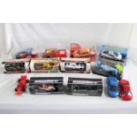 Collection of Scalextric and SCX compatible racing slot car vehicles in original boxes, to include