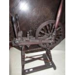 Late C18th turned wooden spinning wheel, loose ring turned baluster spindles on similar supports,