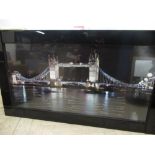 Night time study of Tower Bridge London decorated with Swarovski crystals, in black glass