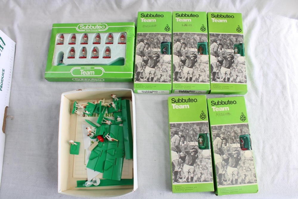 Six Subbuteo football teams - Swansea City, Arsenal, Iran, New England, Wales, Czechoslovakia and