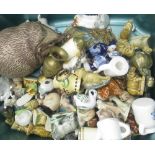 Collection of Wade Whimsies, similar small trinkets, a hedghog figurine and a collection of