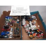 Collection of Transformers models, including robots, spaceships, etc, and Bandai Robo Machines