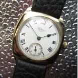 Waltham USA 9ct gold cushion cased hand wound wristwatch, white enamel dial with roman numerals