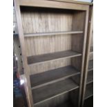 Pair of waxed pine bookcases with five adjustable shelves on plinth base, W89cm D33cm H198cm (2)